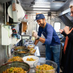 preparing food in the packalachian food truck